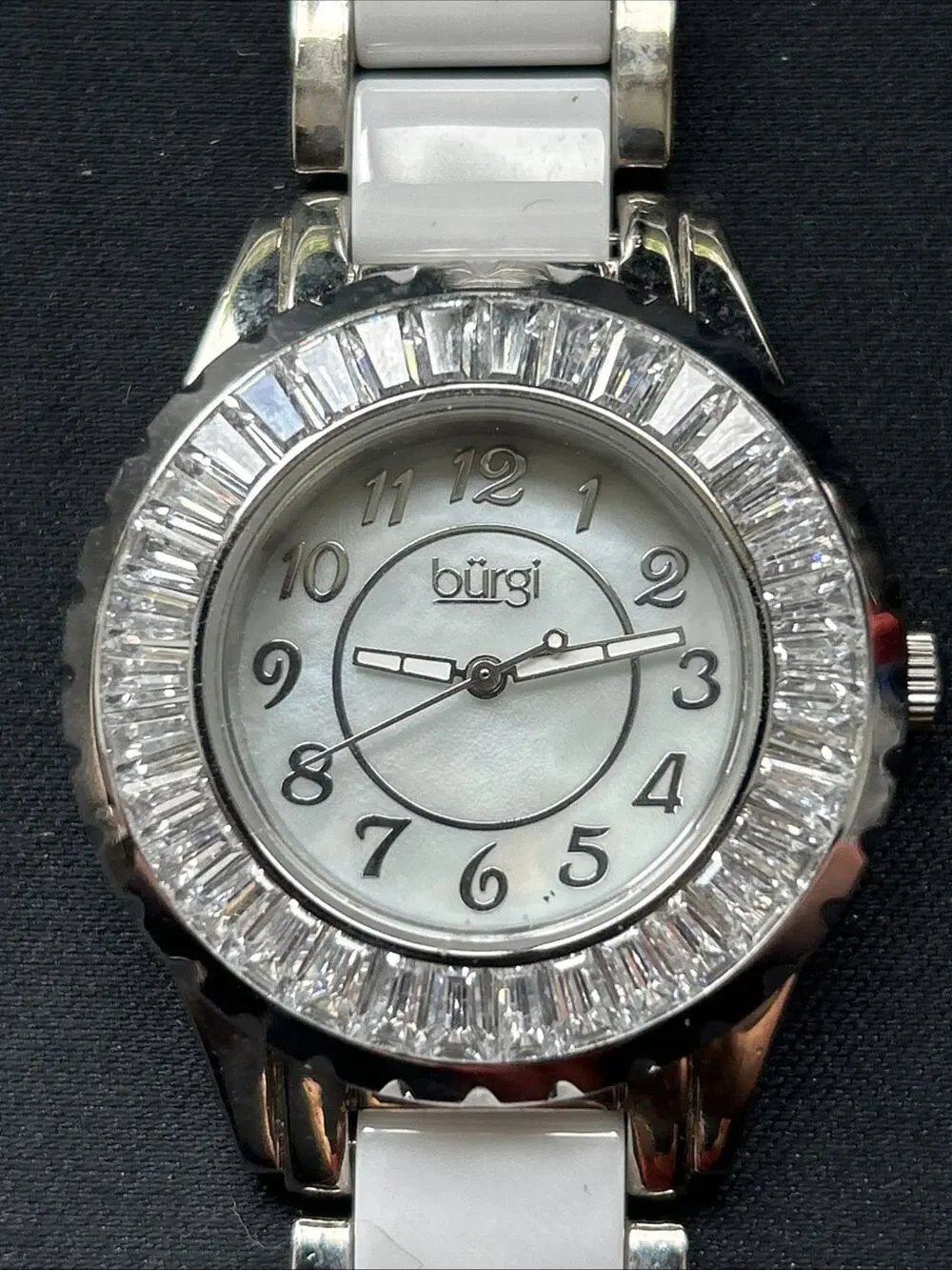 Burgi White And Silver Tone Rhinestone Bezel Women’s Quartz Watch